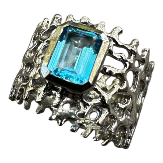 Ring, Fan of the Sea, Black Rhodium, Featuring Emerald Cut Blue Topaz