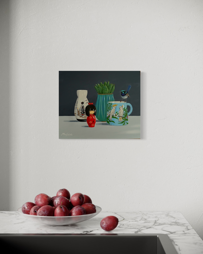 Doll, Cockatoo Mug and Succulent