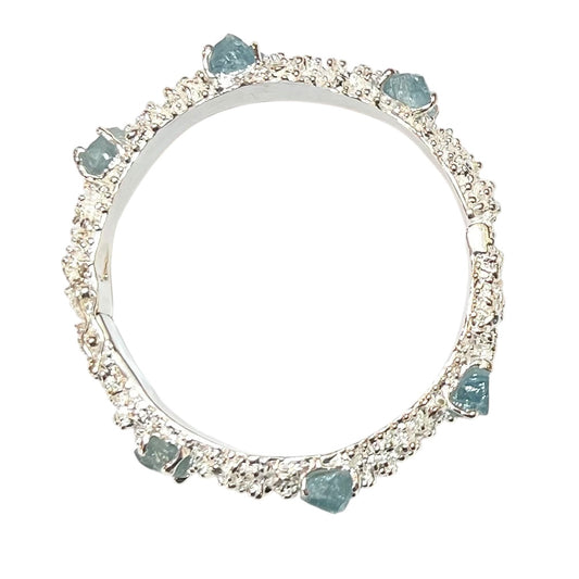 Bangle - Anemone with Lock Clasp. Sterling silver, featuring raw aquamarine, blue sapphire and blue topaz