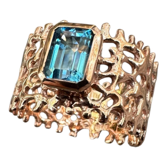 Ring, Fan of the Sea, Rose Gold, Featuring Emerald Cut Blue Topaz
