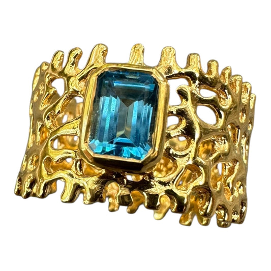 Ring, Fan of the Sea, Yellow Gold, Featuring Emerald Cut Blue Topaz