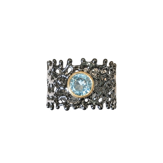 Ring - Fan of the Sea, Rhodium with Yellow Gold Accent around a Blue Topaz