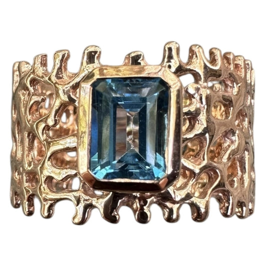 Ring, Fan of the Sea, Rose Gold, Featuring Emerald Cut Blue Topaz