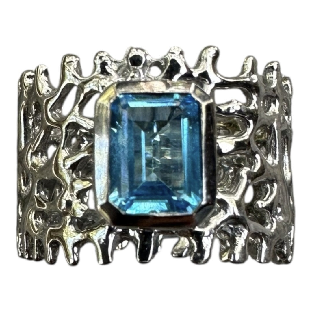 Ring, Fan of the Sea, Black Rhodium, Featuring Emerald Cut Blue Topaz