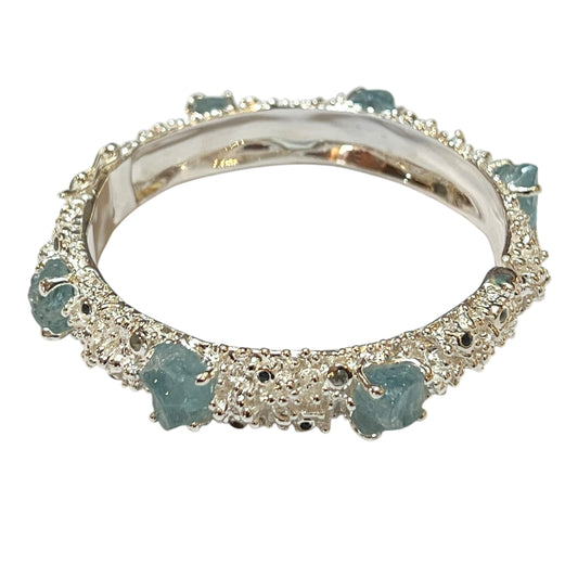 Bangle - Anemone with Lock Clasp. Sterling silver, featuring raw aquamarine, blue sapphire and blue topaz
